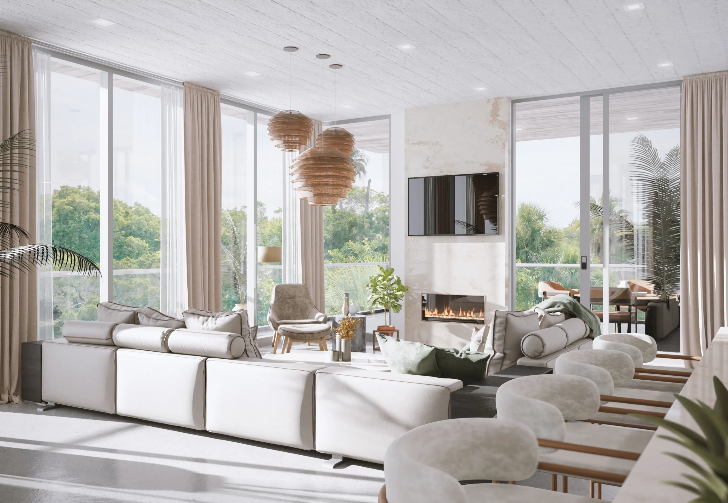 A photo of a modern living room with a large couch, a coffee table, and a TV. There is a fireplace on the wall behind the couch. The room is decorated with artwork and plants.