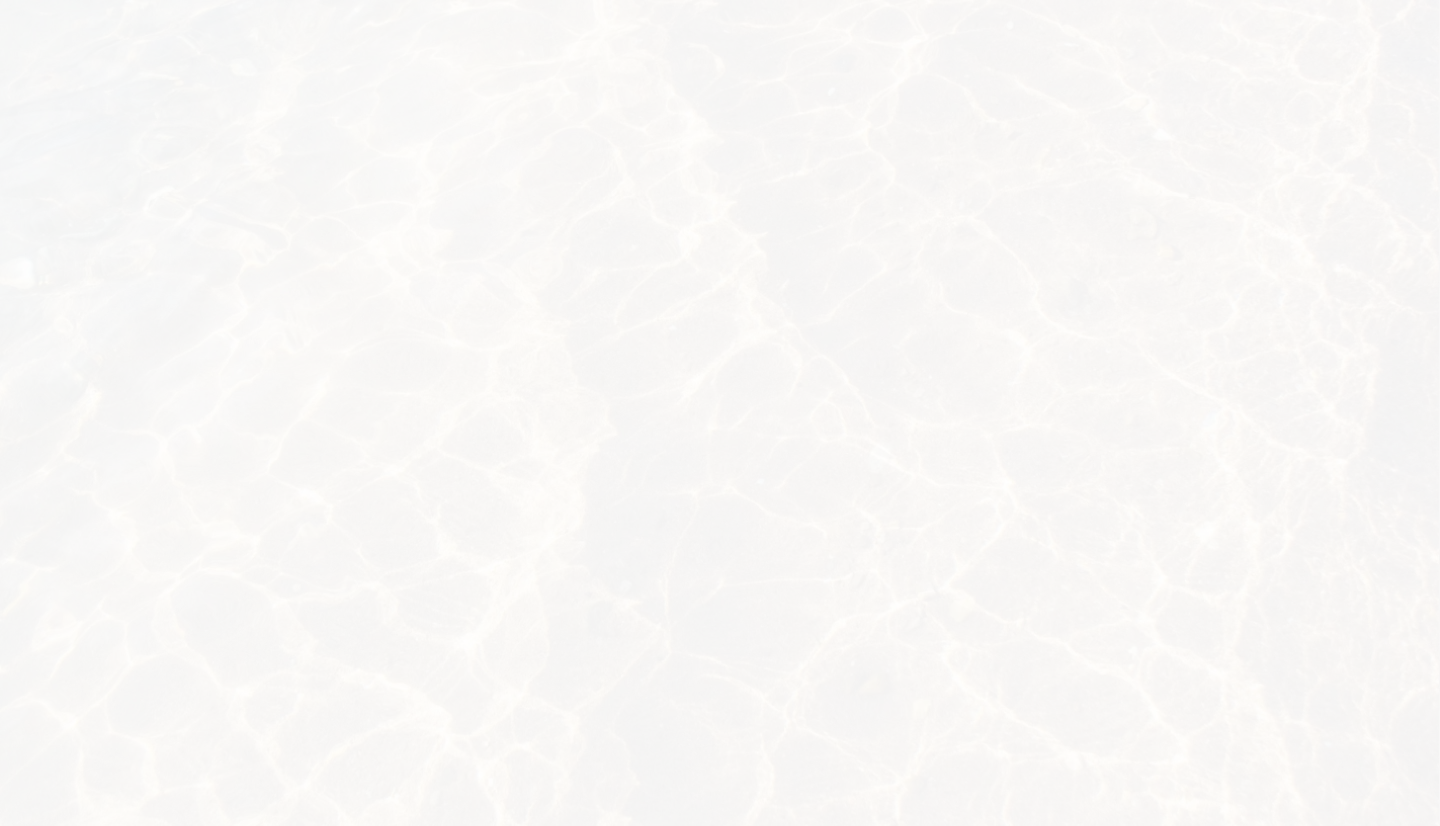 A close-up of a gray wall with a subtle, irregular pattern.